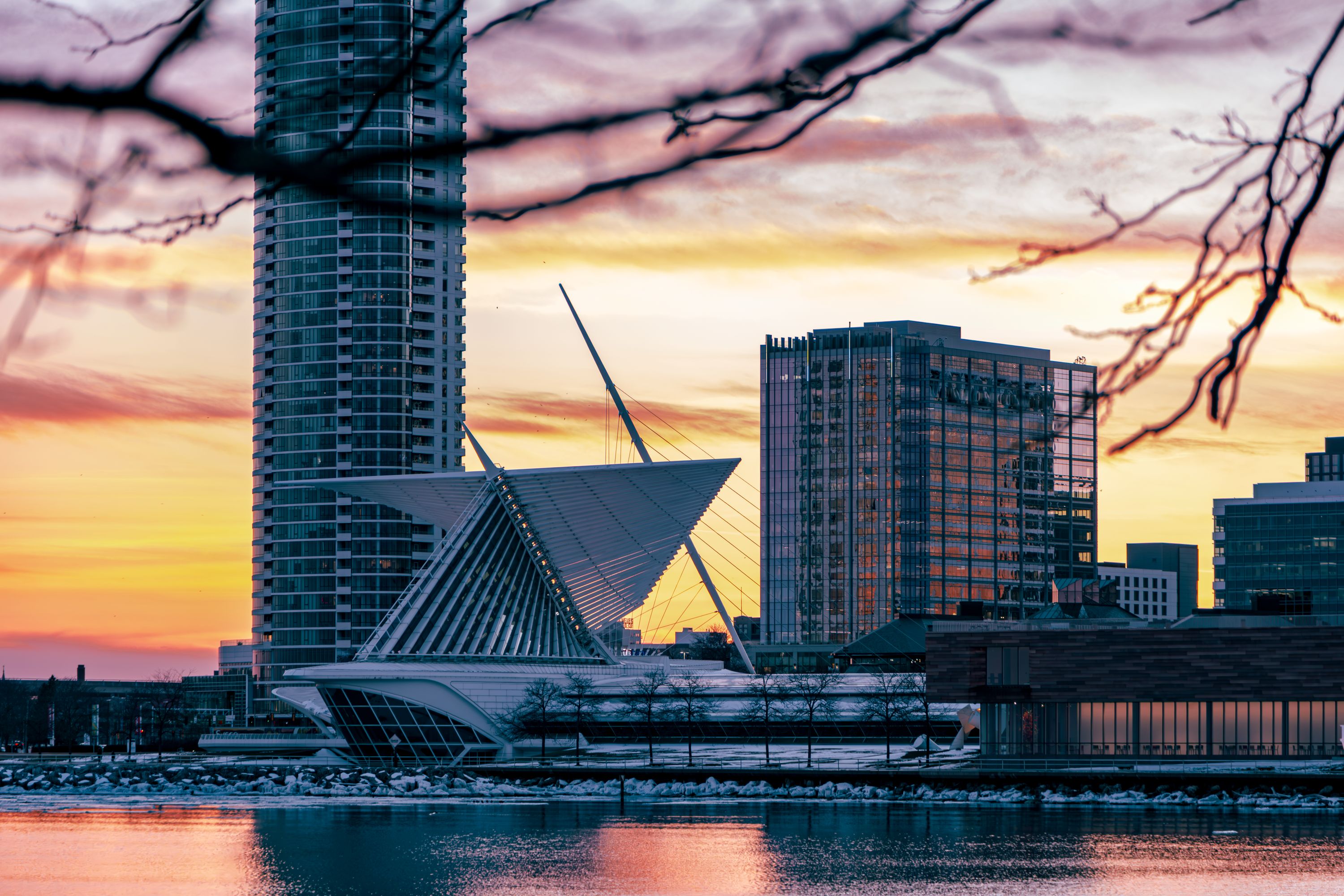 Milwaukee Art Museum and lakefront skyline at sunset